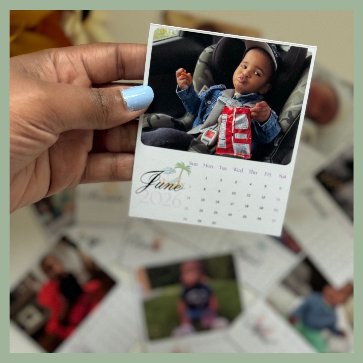 Hand holding custom June photo calendar magnet with personal photo, fridge keepsake gift idea