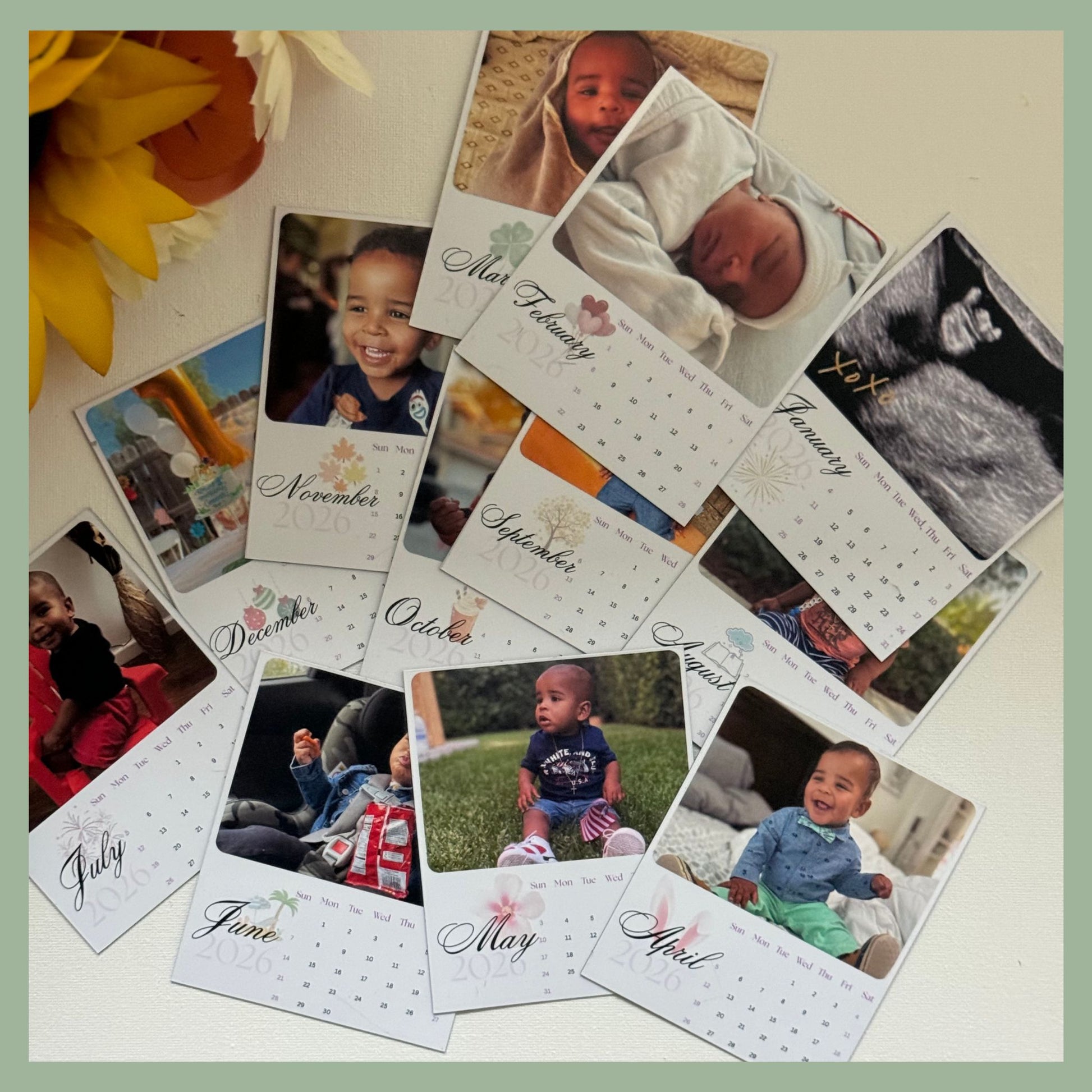 Scattered set of custom photo calendar magnets with monthly family photos, personalized magnetic keepsakes